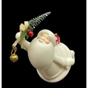 Flying Santa w/Christmas Tree Porcelain White Christmas Ornament 5”